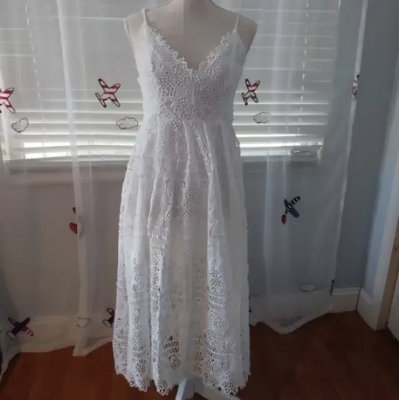 Charlotte Russe midi dress features spaghetti strap and v neck. - Picture 1 of 4